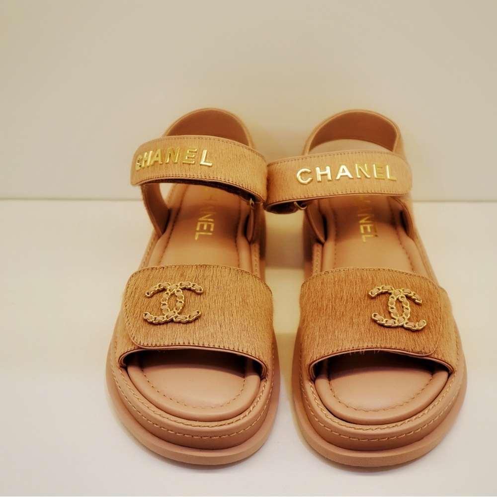 CHANEL pink Sandals with Gold Accents
